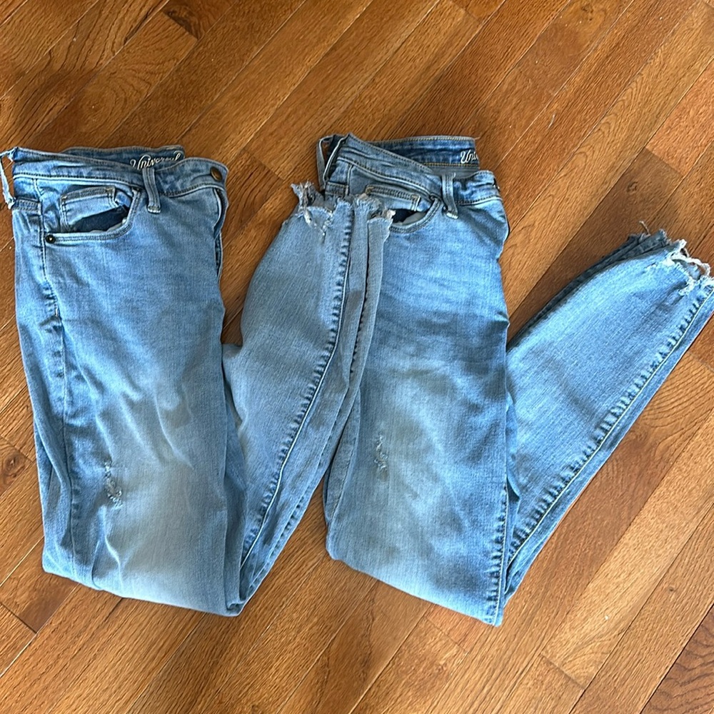 Set of Universal Thread fray skinny jeans